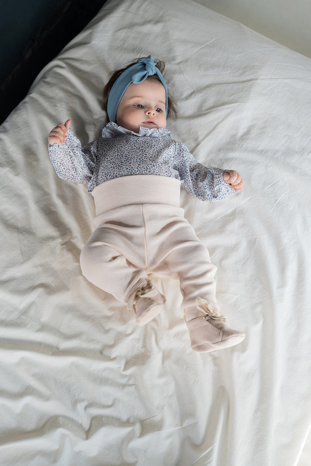 Ecru knitted baby trousers
