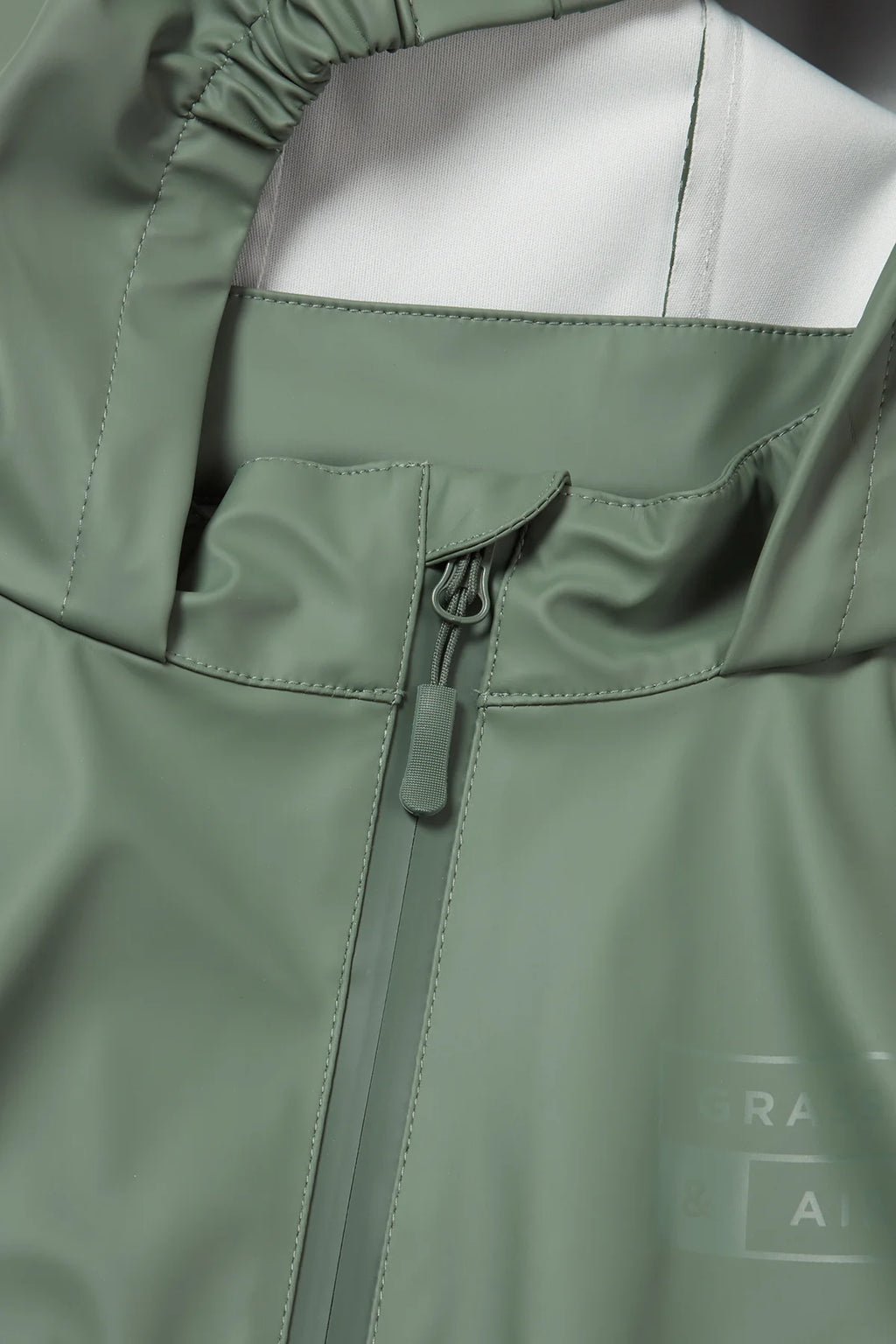 Olive hooded rain jumpsuit
