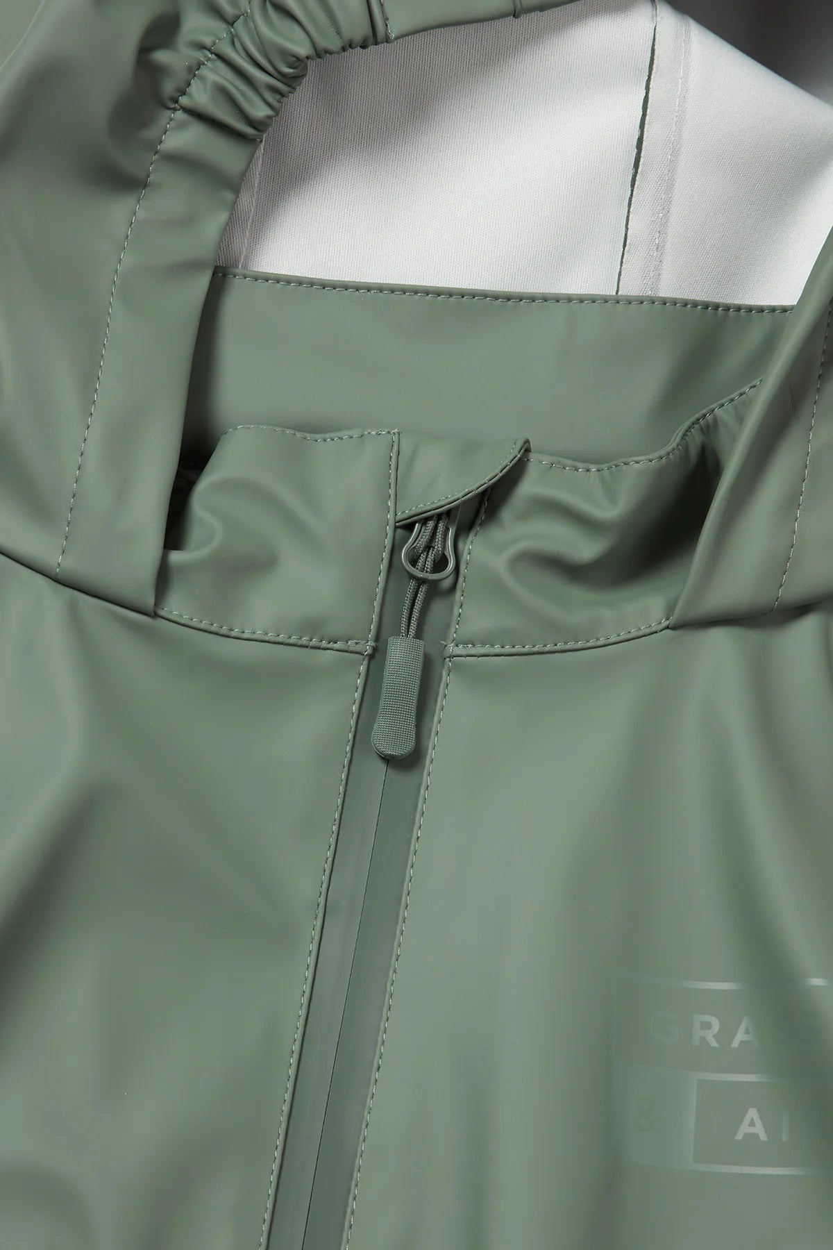 Olive hooded rain jumpsuit