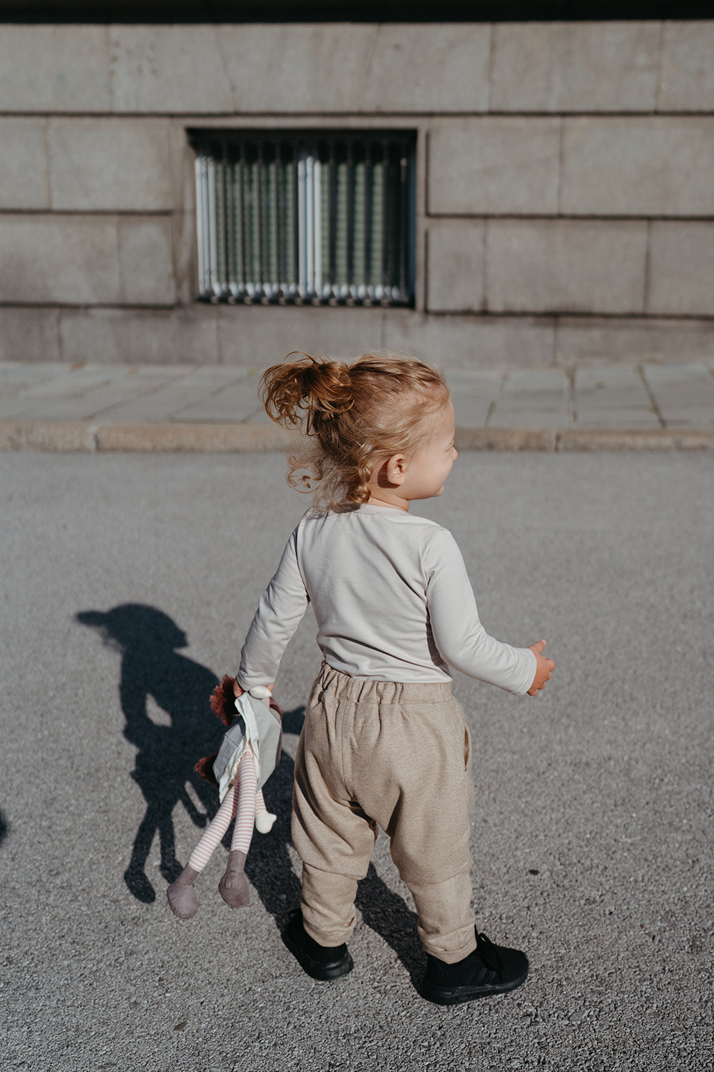 Long-sleeved sand bodysuit